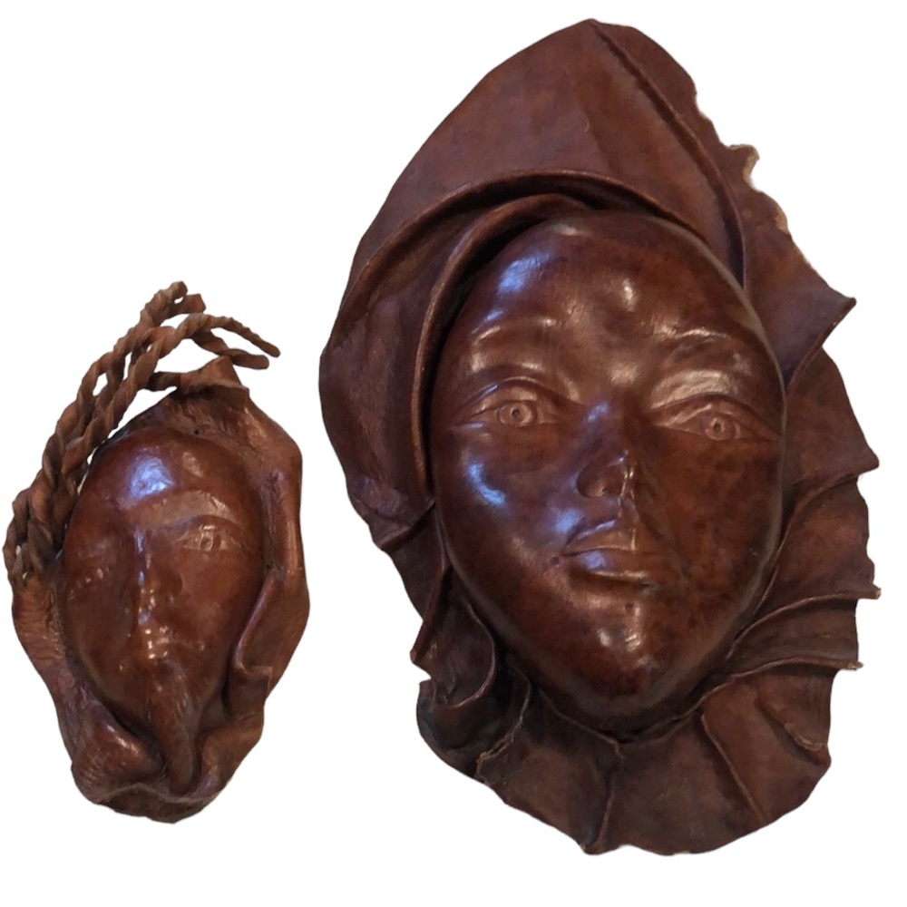 VINTAGE HAND MOLDED LEATHER WOMAN AND CHILD FACES